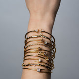 The JJ Knot Princess Shape Diamond Bangle